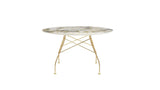 Glossy round table by Kartell